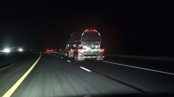 Motion Blur Night Expressway Semi Tanker Truck alternate text for this image