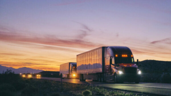 Long Haul Semi Truck On a Rural Western USA Interstate Highway alternate text for this image