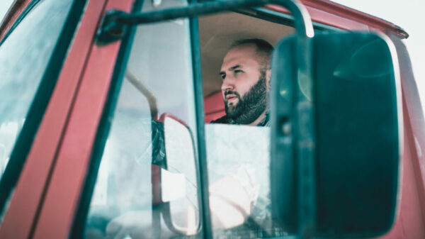 Bearded Truck Driver With Open Window alternate text for this image