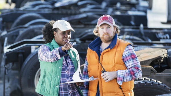 Workers at trucking company alternate text for this image