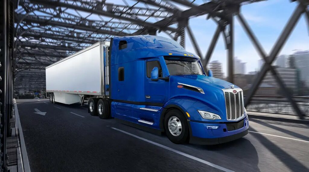Peterbilt 579 bleu sur un pont