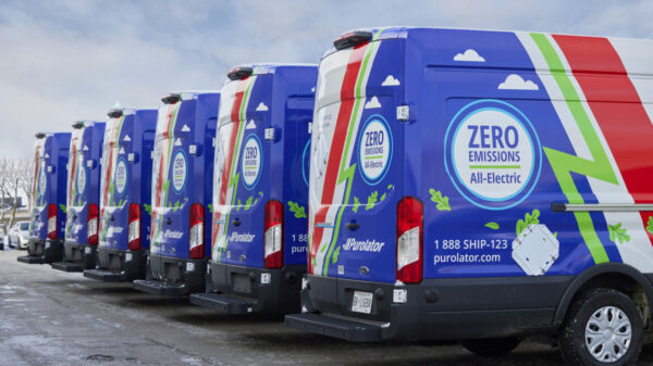Purolator-Ford-E-Transit-logo-visible-1536×1025 alternate text for this image