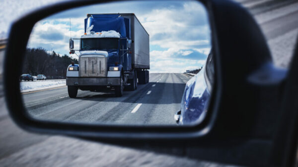 Semi Truck in Mirror alternate text for this image
