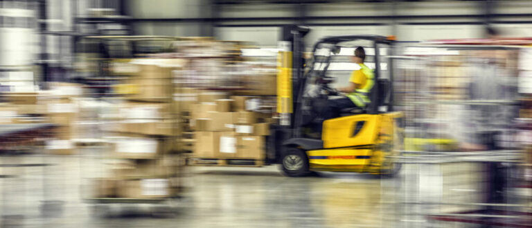 Forklift in warehouse alternate text for this image