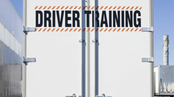 Driver training written on back of truck alternate text for this image