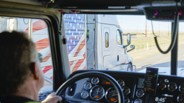 Drivers Cab View on a Semi Truck on the Highway alternate text for this image